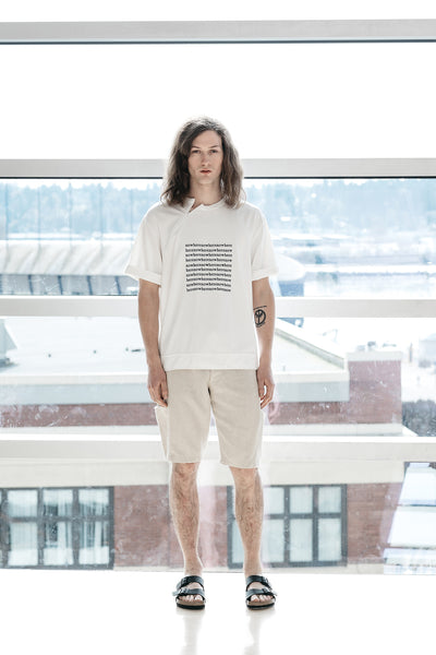 Slow fashion concepts by Nowhere Studio white short sleeve shirt with embroidered graphic