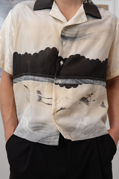 Front detail view of menswear bowling shirt with deconstructed vintage print composition on silk by nowhere studio"
