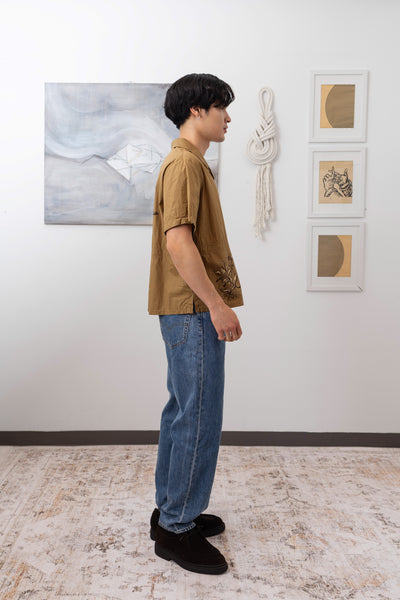 Side full view of bowling men's shirt with hand painted motifs and side slits by nowhere studio