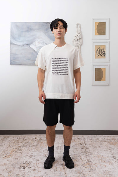 Front view of white printed menswear  shirt with logo embroidered graphic and invisible zipper by nowhere studio