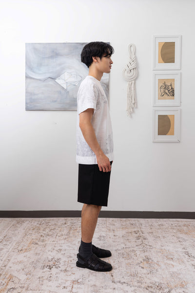 Full side view of white printed short sleeve menswear shirt  by nowhere studio