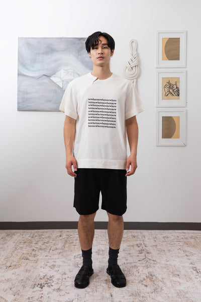 Front view of white printed menswear  shirt with logo embroidered graphic and invisible zipper by nowhere studio