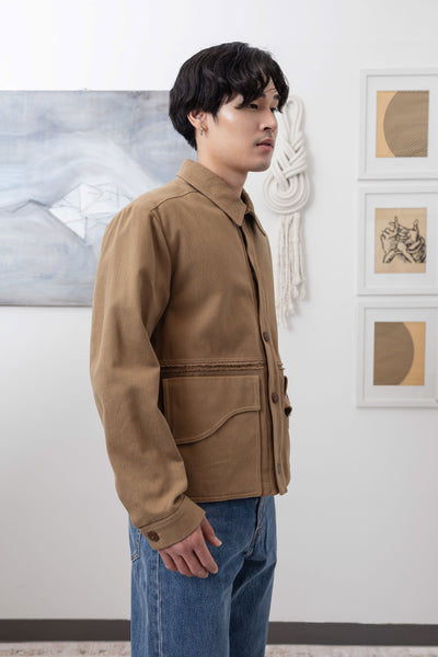 Earth workwear jacket close-up right side, dual-entry pockets on brushed bull denim by nowhere studio