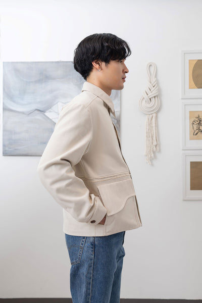 Ivory workwear jacket close-up right side, dual-entry pockets on brushed bull denim by nowhere studio