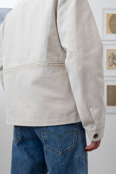 Ivory workwear jacket back detail, inserted selvedge fringe at centre panel by nowhere studio