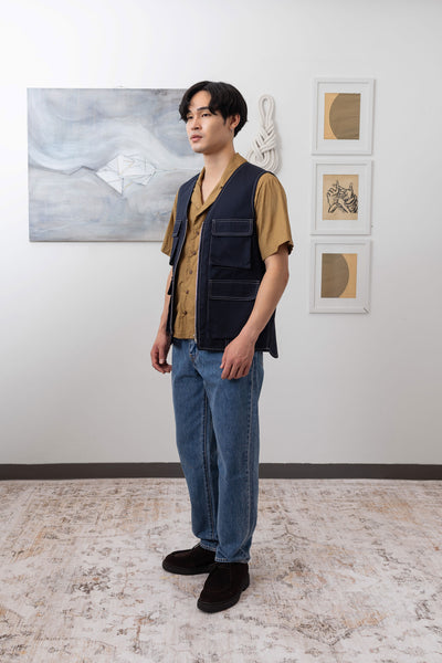 Full profile view of fisherman's vest in Admiral mid-weight twill with 3D cargo pockets and D-rings by nowhere studio