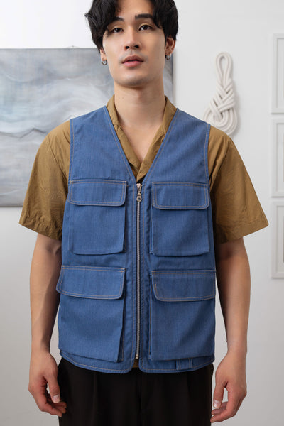 Close-up front detail of fisherman's vest in Denim mid-weight twill with double-needle topstitching and zipper closure by nowhere studio