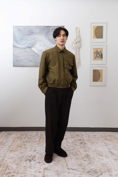Army Harrington jacket profile view, water-resistant nylon and relaxed silhouette by nowhere studio