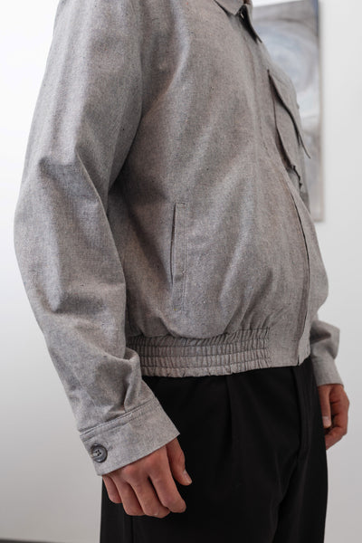 Workwear Harrington jacket side detail of elasticized waistband and utilitarian seam construction by nowhere studio