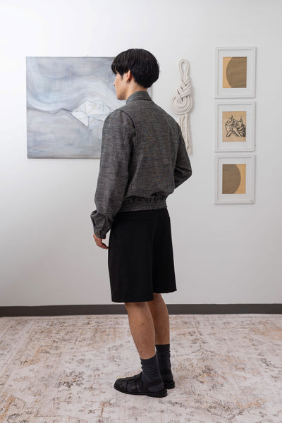 Yarn dye navy Harrington jacket full back left view, back vent construction for ease of movement by nowhere studio