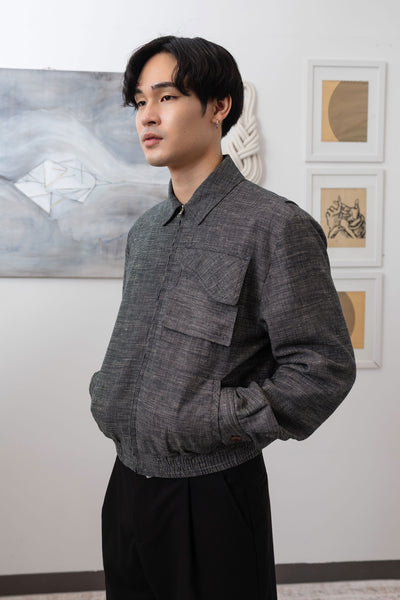 Yarn dye navy Harrington jacket close-up left side, textured hemp organic cotton wool weave by nowhere studio