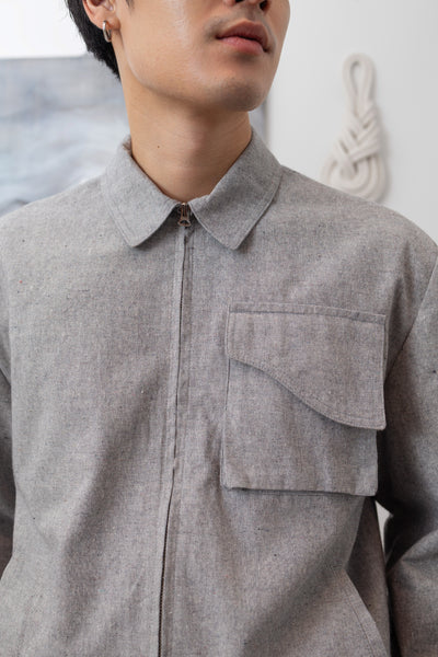 Front detail view of Granite Harrington jacket with cargo pocket flap, classic collar, and zipper closure by nowhere studi