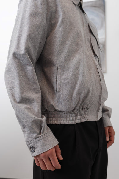Workwear Harrington jacket side detail of elasticized waistband and utilitarian seam construction by nowhere studio