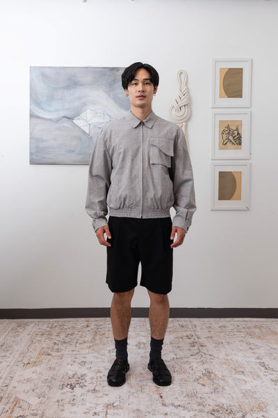 Full front view of Granite Harrington jacket with metal zipper and utility details by nowhere studio