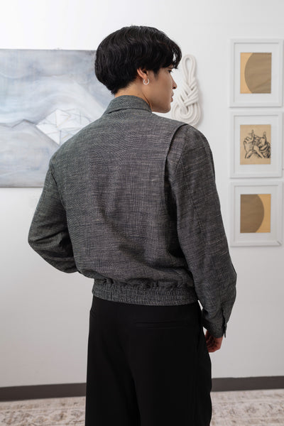 Yarn dye navy Harrington jacket close-up back right, textured plain weave and workwear seam detail by nowhere studio