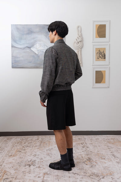 Yarn dye navy Harrington jacket full back left view, back vent construction for ease of movement by nowhere studio