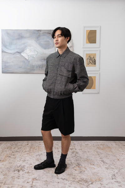 Yarn dye navy Harrington jacket full left side view, elasticized waistband and blouson fit by nowhere studio