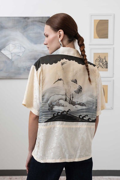Close-up back view of studio shirt in vintage printed fabric with hand embroidered accents by nowhere studio