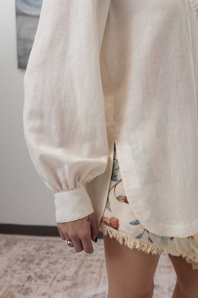 Sleeve detail of sculptural blouse in ivory — exaggerated sculptural volume in woven fabric, nowhere studio