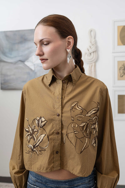 Close-up front alternate view of hand painted artisanal blouse in tan — hand-painted brushwork on cropped silhouette, nowhere studio