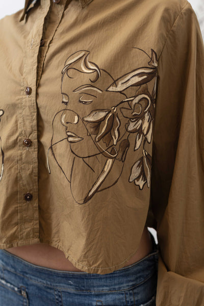 Side detail of hand painted artisanal blouse in tan — artisanal painted surface in woven fabric with elastane, nowhere studio