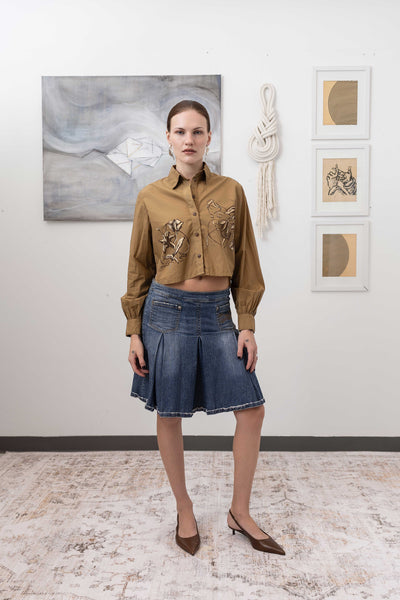 Hand painted artisanal blouse in tan, full front view — hand-painted brushwork on fluid silhouette, nowhere studio