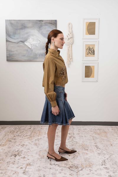 Hand painted artisanal blouse in tan, right side view — rounded sleeve volume with artisanal painted finish, nowhere studio