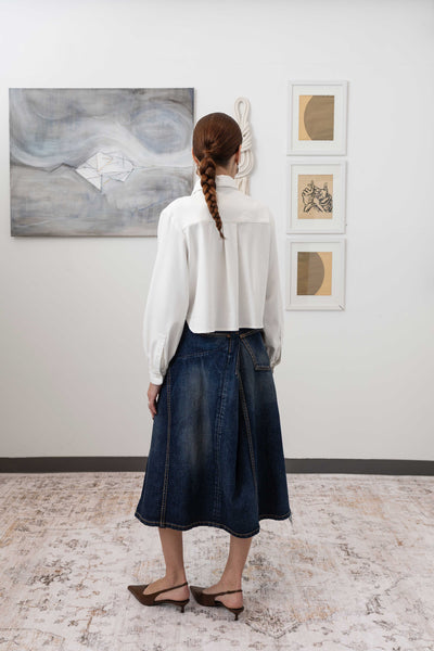 Artisanal blouse in white, full back view — fluid Tencel twill with quiet movement and modernist form, nowhere studio