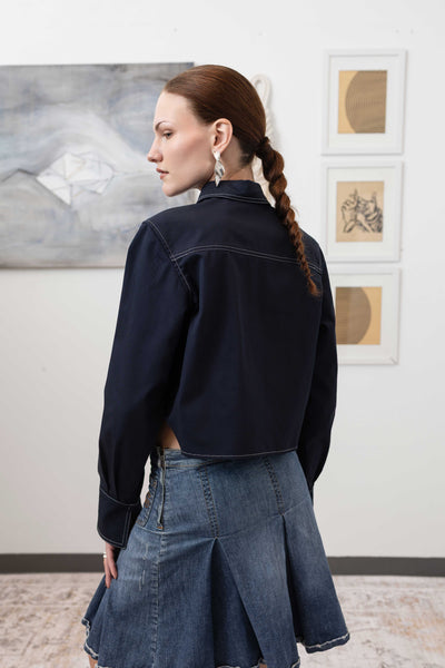 Close-up back left detail of utilitarian shirt in Admiral — double-needle contrast topstitching, nowhere studio