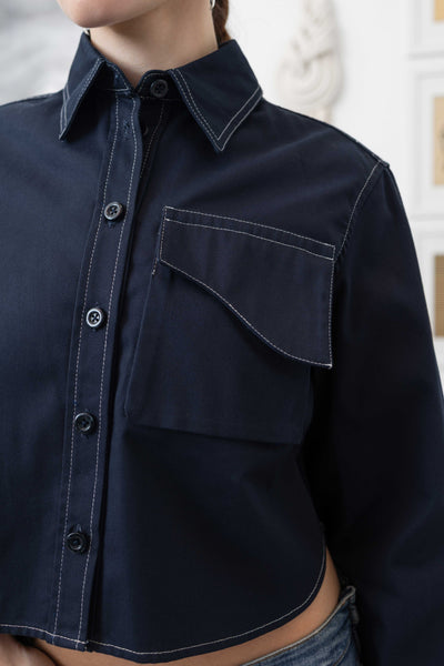Front detail of utilitarian shirt in Admiral — cargo pocket and contrast topstitching, nowhere studio