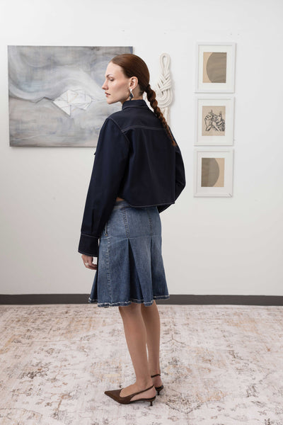 Utilitarian shirt in Admiral, back left view — contrast topstitching traces each style line, nowhere studio