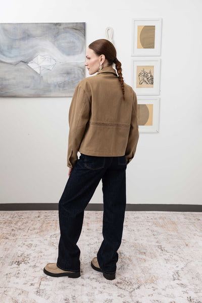 Workwear jacket in earth, full back left view — selvedge fringe panel with material-led textural finish, nowhere studio