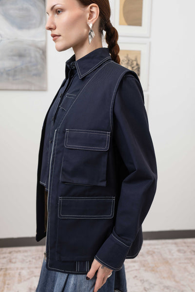 Close-up left side detail of fisherman's vest in Admiral mid-weight twill with utilitarian seam construction by nowhere studio