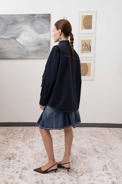 Full back left view of fisherman's vest in Admiral mid-weight twill with double-needle topstitching by nowhere studio