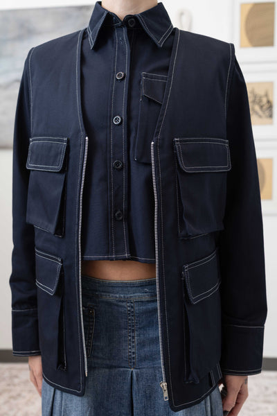 Front detail of fisherman's vest in Admiral mid-weight twill with cargo pocket and hardware detail, nowhere studio