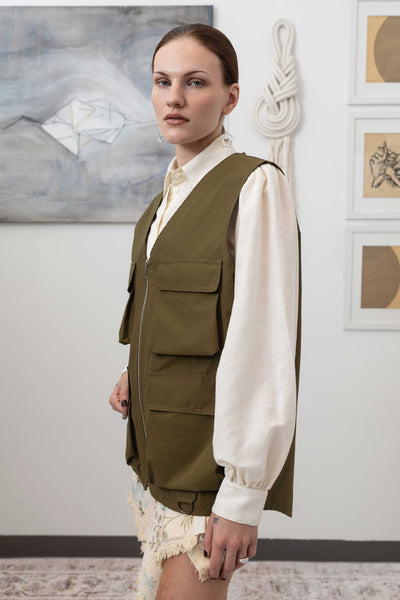 Close-up left side detail of fisherman's vest in Army mid-weight twill with D-rings and cargo pocket construction by nowhere studio