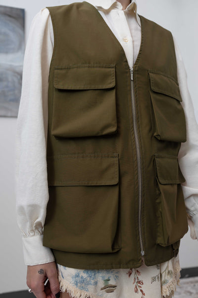 Right side detail of fisherman's vest in Army mid-weight twill — seam construction and utilitarian pocket detail, nowhere studio