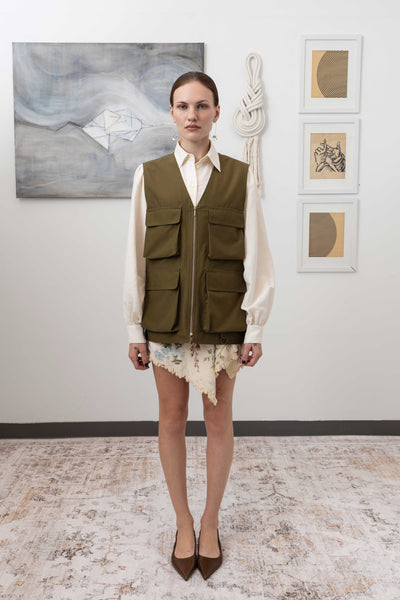 Full front view of fisherman's vest in Army mid-weight twill with 3D cargo pockets and zipper closure by nowhere studio
