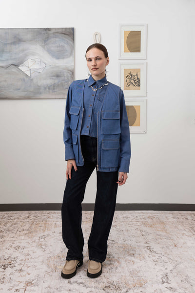 Full front alternate view of fisherman's vest in Denim mid-weight twill with 3D cargo pockets and D-ring tabs by nowhere studio