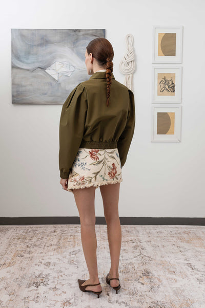 Sculptural blouson jacket in army, full back left view — modernist sculptural form with elasticized hem in sleek Italian mill nylon, nowhere studi