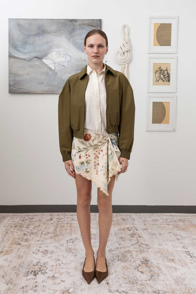 Sculptural blouson jacket in army, full front view — rounded silhouette with metal zip and welt pockets in water-resistant deadstock nylon, nowhere studio