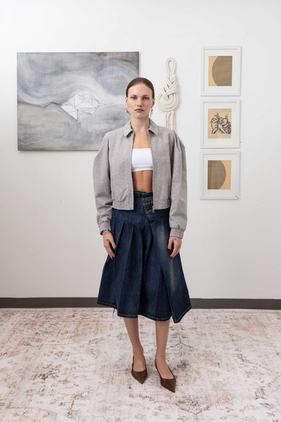 Sculptural blouson jacket in granite, full front view — rounded silhouette with metal zip and welt pockets in yarn-dye canvas, nowhere studio