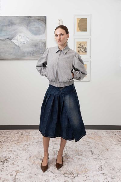Sculptural blouson jacket in granite, profile view — pleated sleeves and gathered waist in mid-weight natural canvas, nowhere studio