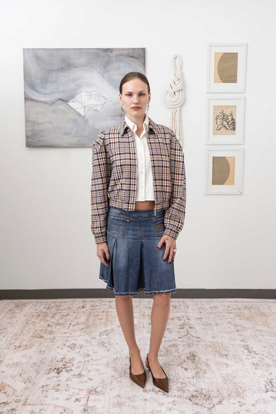 Sculptural blouson jacket in yarn-dye plaid, full front view — rounded silhouette with pleated sleeves and gathered waist in yarn-dyed twill, nowhere studio