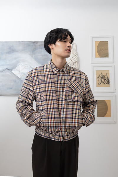 Yarn dye plaid Harrington jacket editorial view, relaxed workwear silhouette by nowhere studio